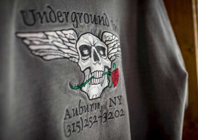 Underground logo embroidered on shirt